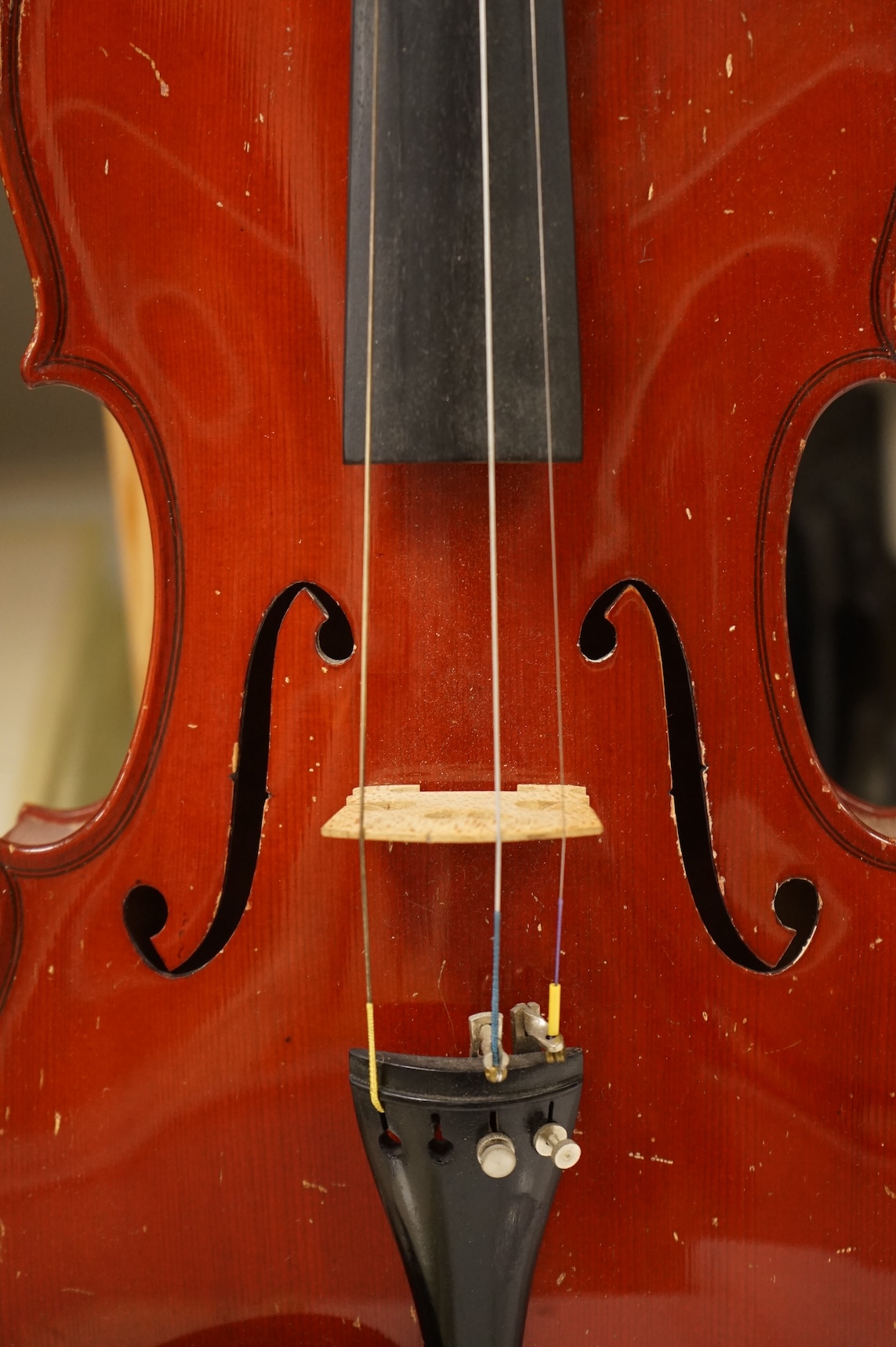 Three musical instruments to include a Buffet flute and violin with two bows